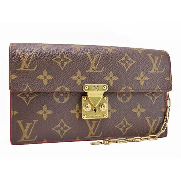 LOUIS VUITTON Portefeuille Lock Mini Fuchsia Lockme Trifold Wallet